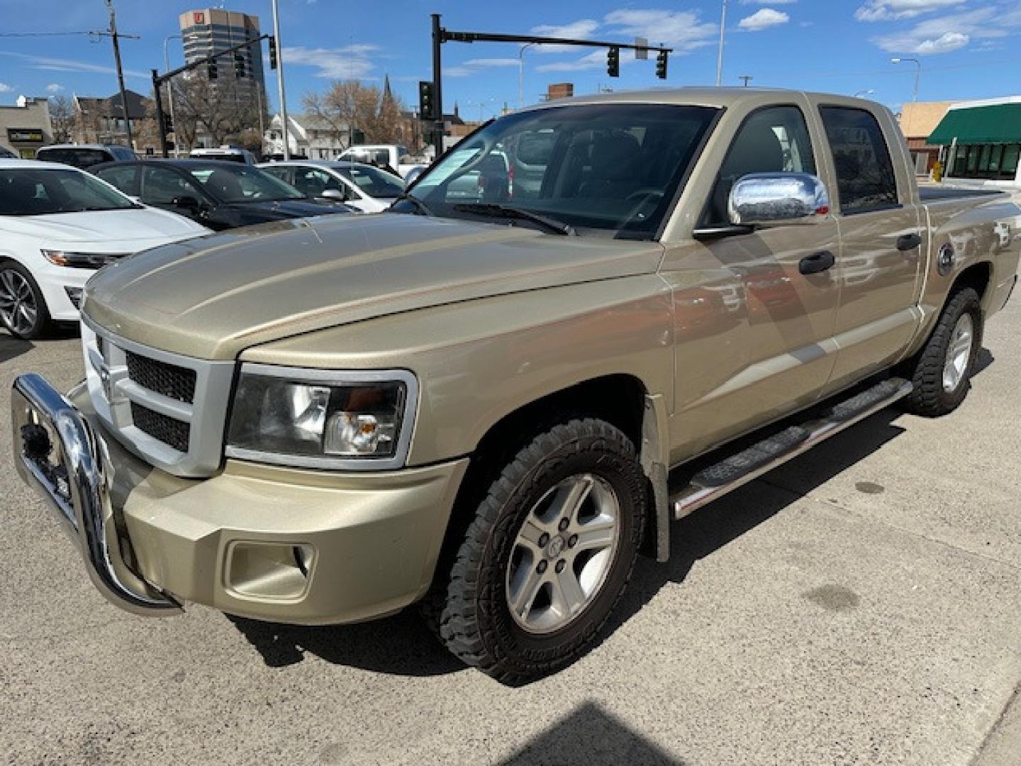 2011 /BEIGE Dodge Dakota SLT (1D7RW3GK3BS) with an 3.7 V6 engine, Automatic transmission, located at 3200 1st Avenue North, Billings, MT, 59101, (406) 245-9055, 45.779270, -108.510742 - Very Nice 4 Door Pickup with A Ton of Options! Power Windows, Power Door Locks, Remote Key Entry, Rugged Terrain Tires, Tilt Steering Column, Cruise Control, 4X4, Running Boards, Tonneau Cover, Towing, Custom Bumper Guard and Only 79,000 Miles. CarFax Dealer Auto Brokers of Montana/AA&A Auto Ren - Photo#0